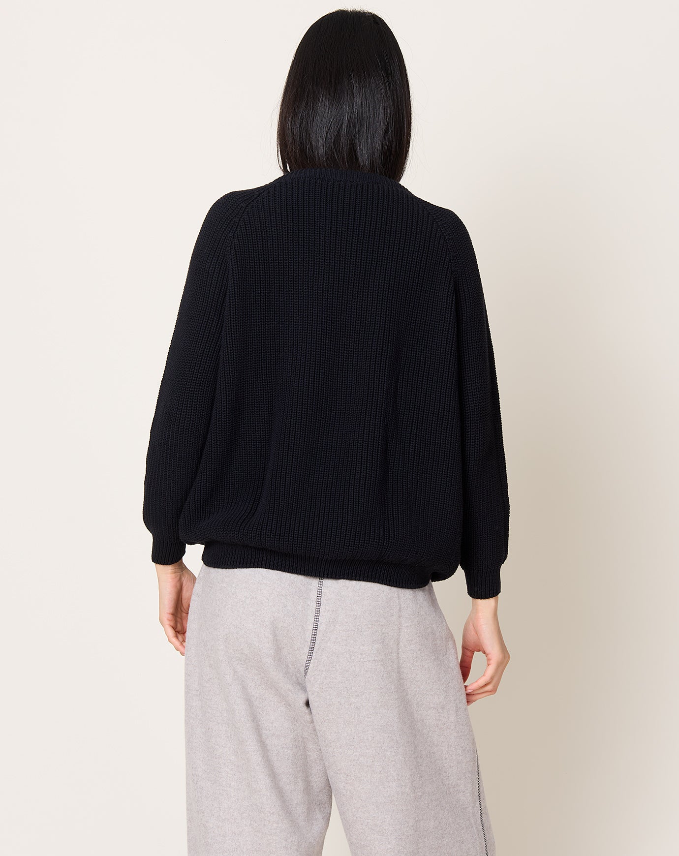 Baserange Danube V Neck Sweater in Black