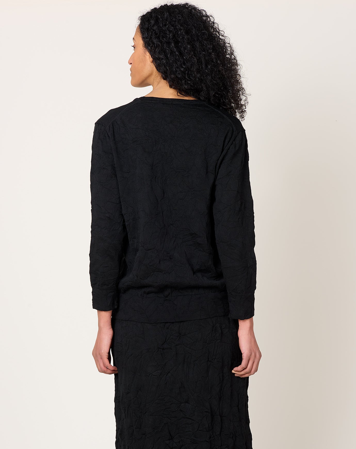 Black Crane Crinkled Summer Knit Top in Black