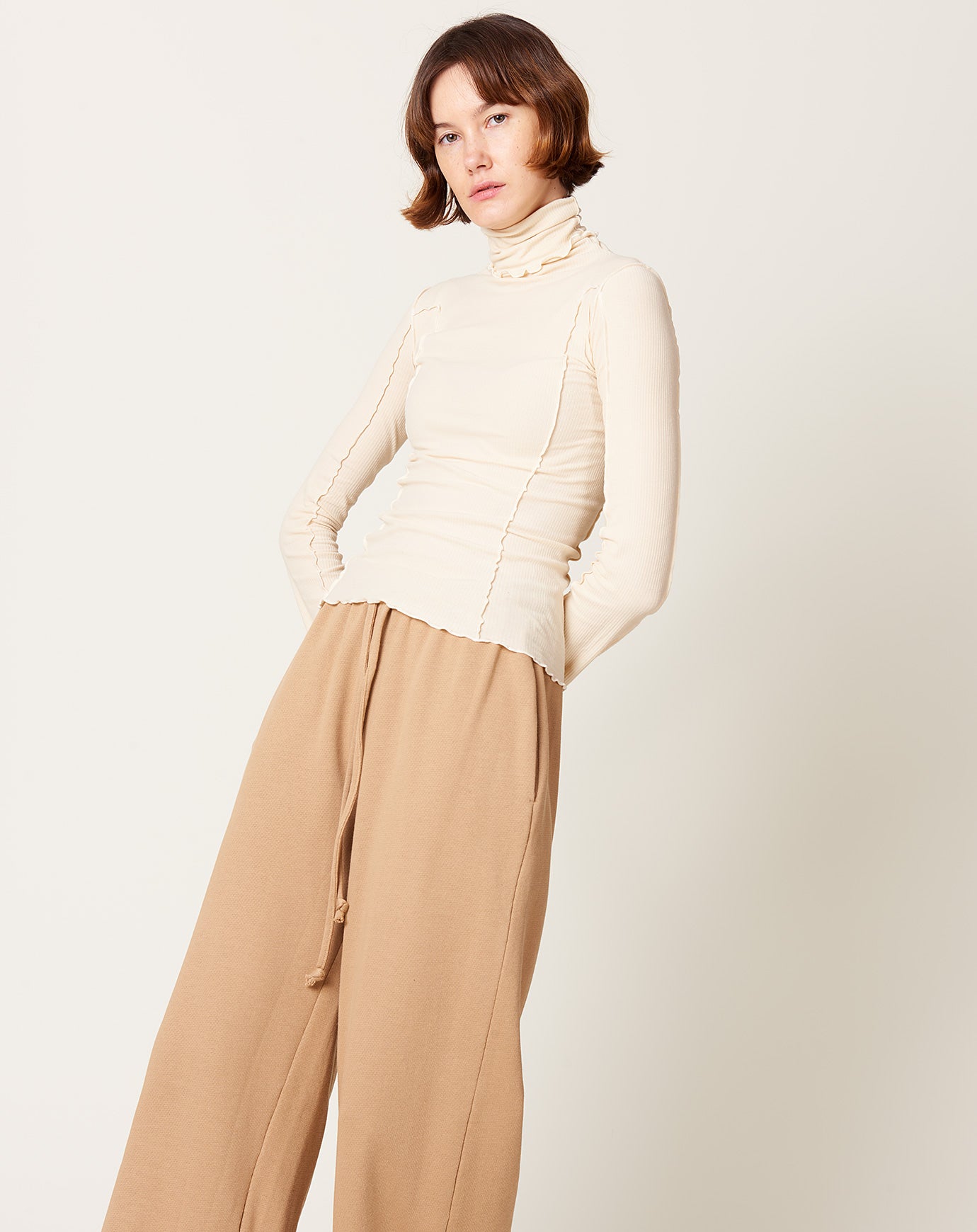 Baserange Omato Turtleneck in Off White