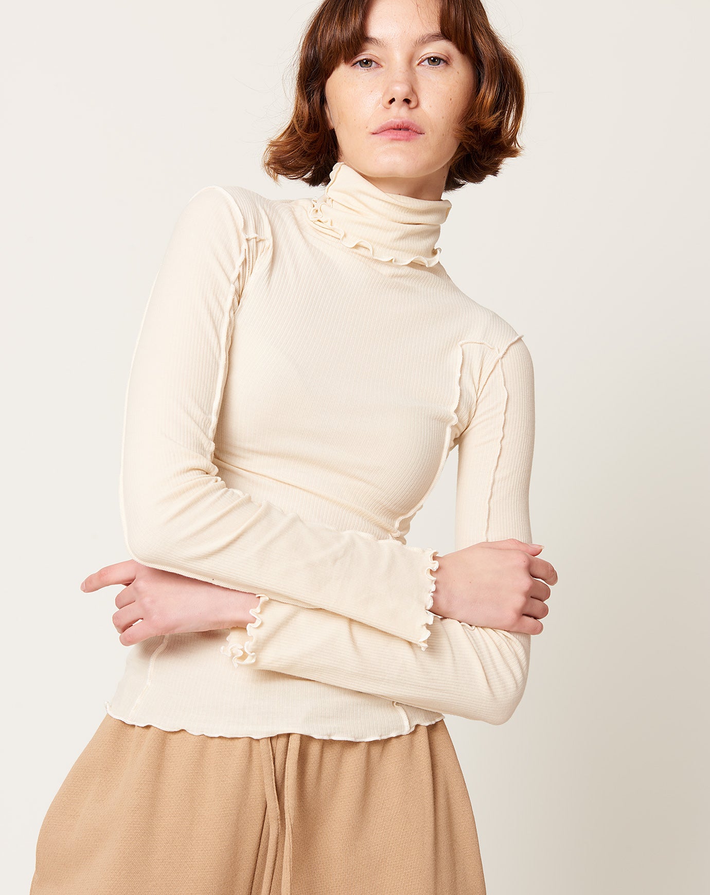 Baserange Omato Turtleneck in Off White