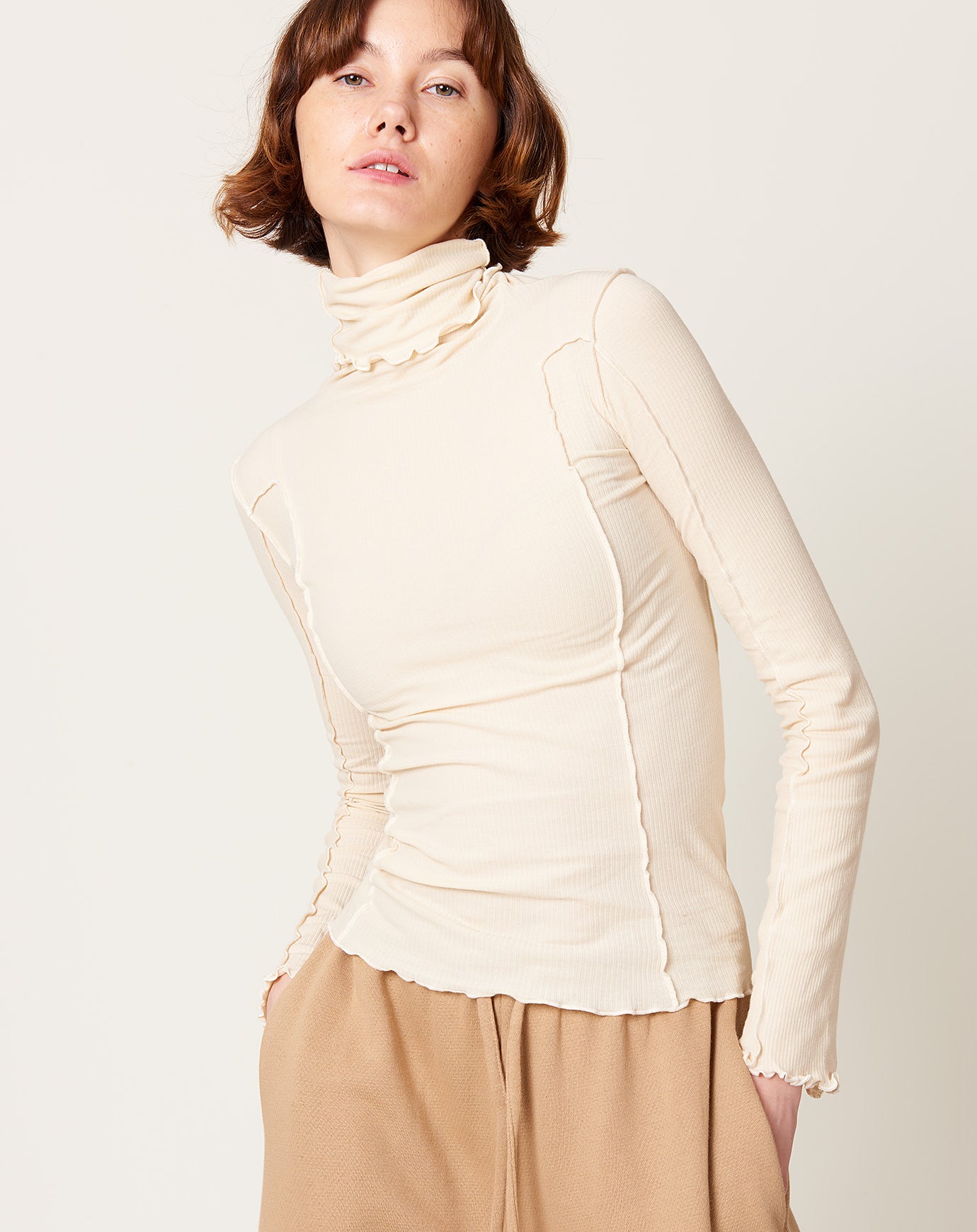 Baserange Omato Turtleneck in Off White