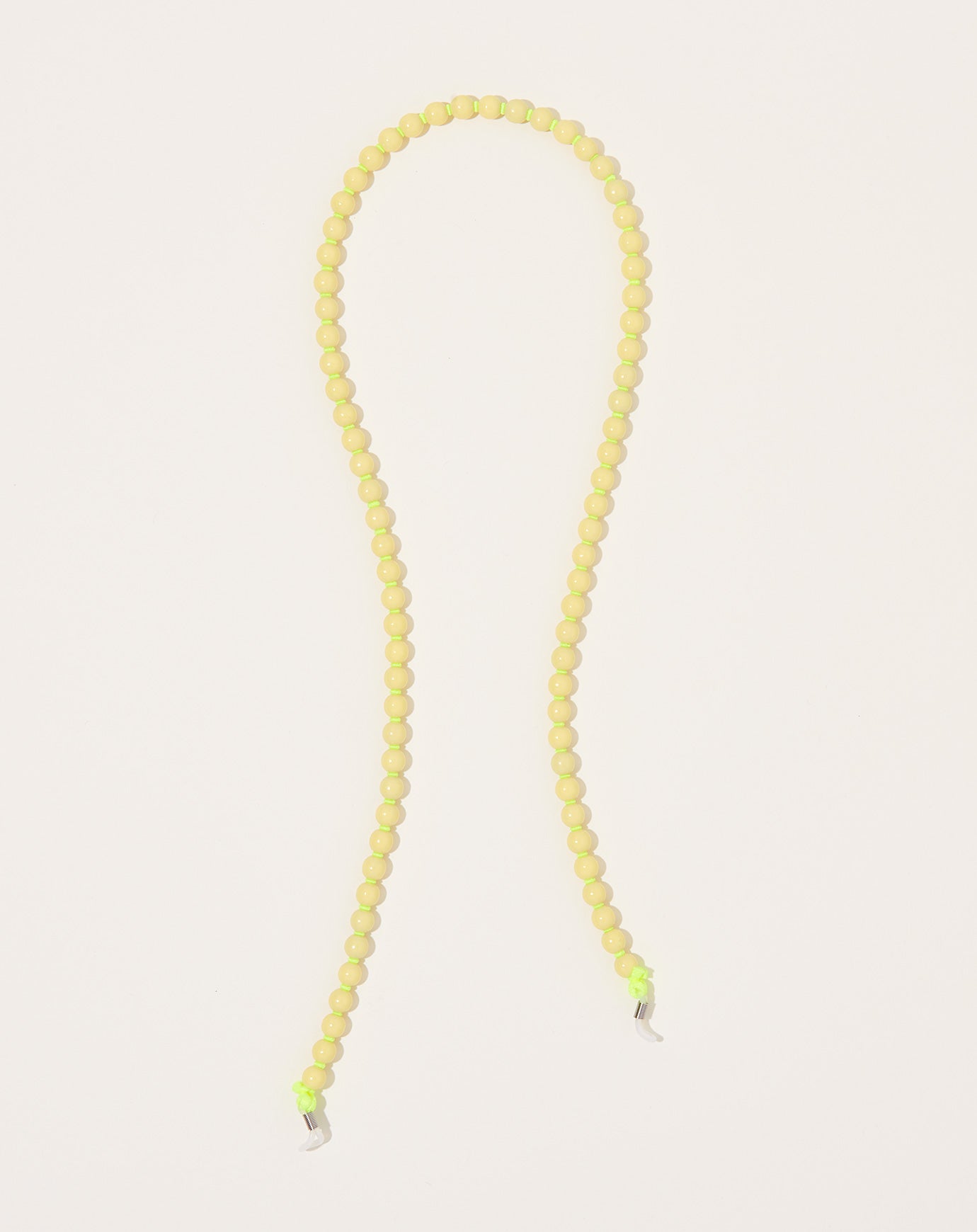 Ina Seifart Brillenkette Eyeglass Chain in Pastel Yellow on Neon Yellow