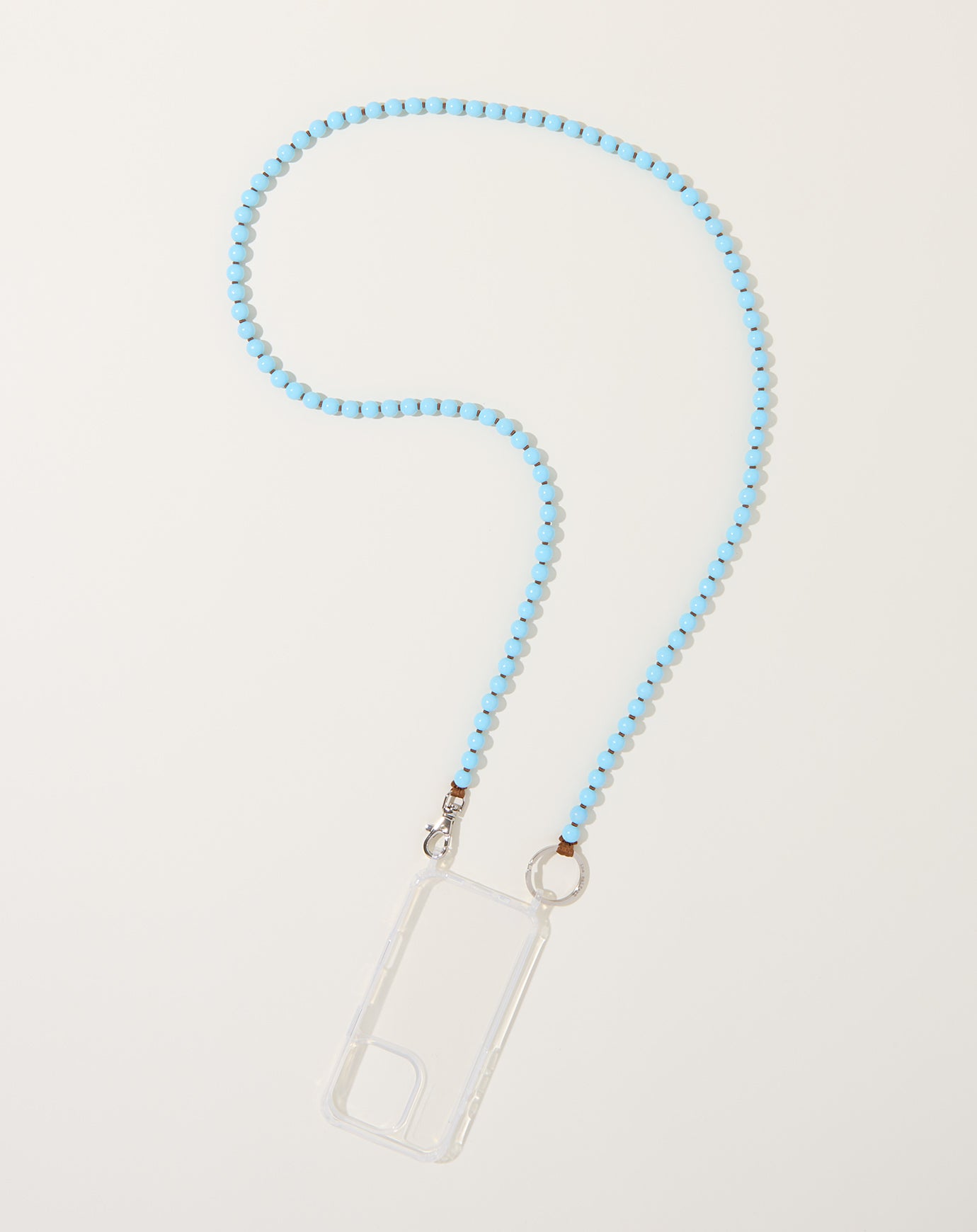 Ina Seifart Handykette iPhone Necklace in Pastel Blue on Mocha