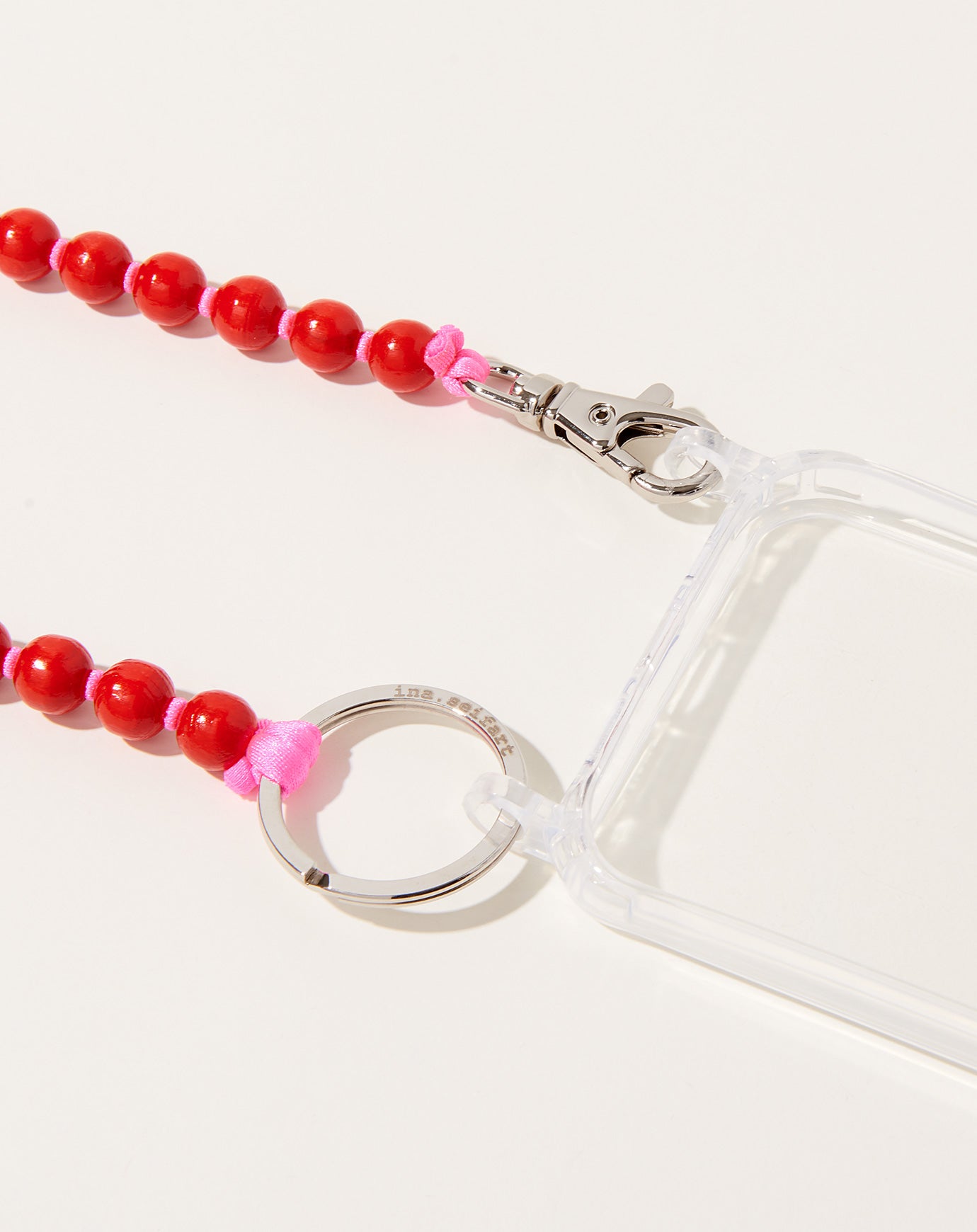 Ina Seifart Handykette iPhone Necklace in Red on Pink