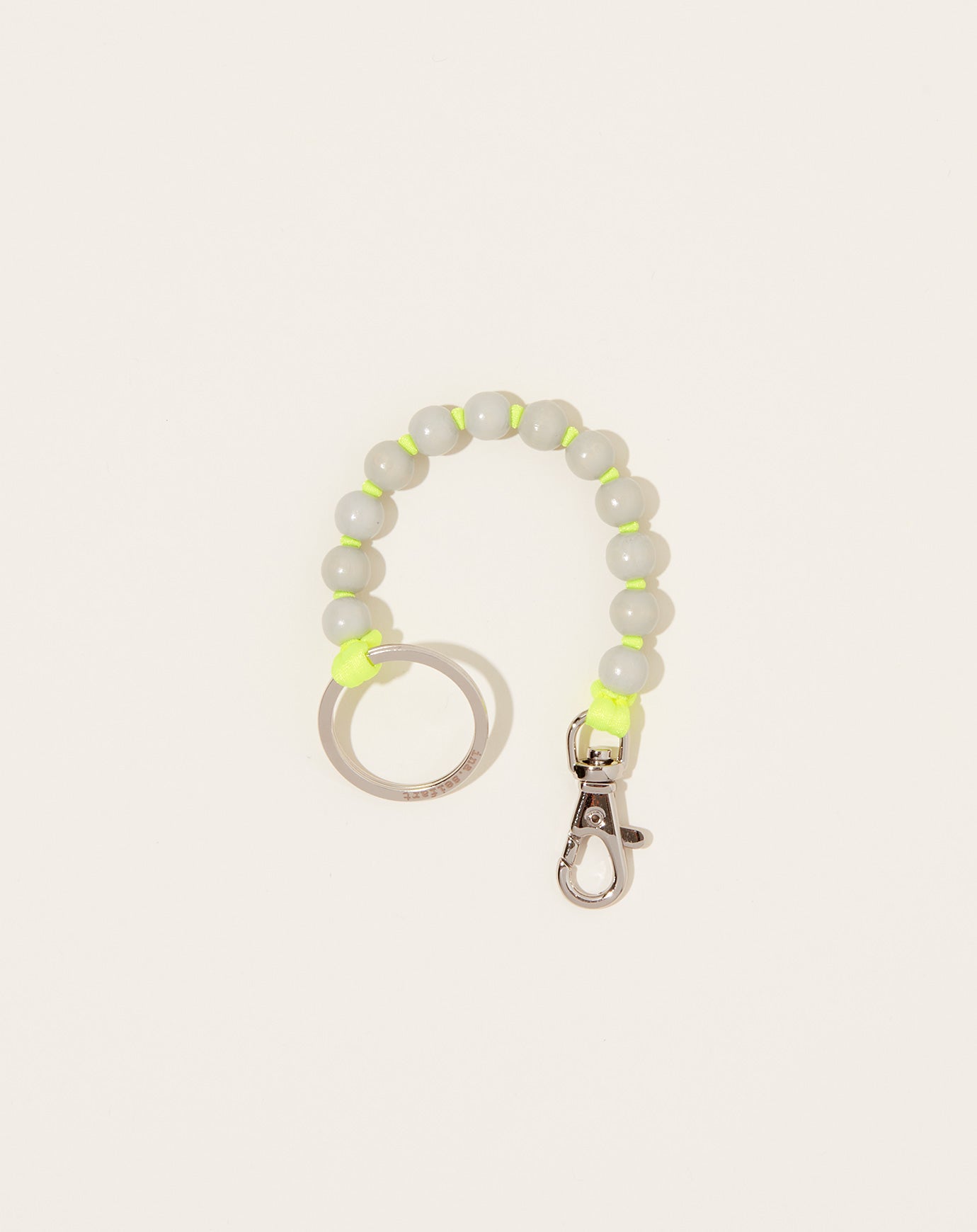 Ina Seifart Perlen Short Keyholder in Light Grey on Neon Yellow