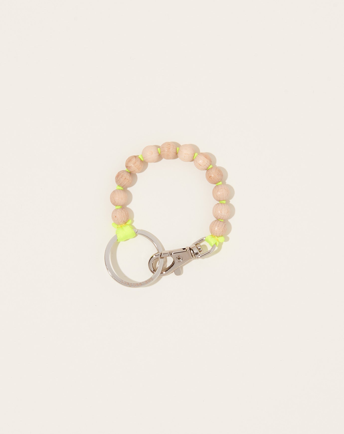 Ina Seifart Perlen Short Keyholder in Natural on Neon Yellow