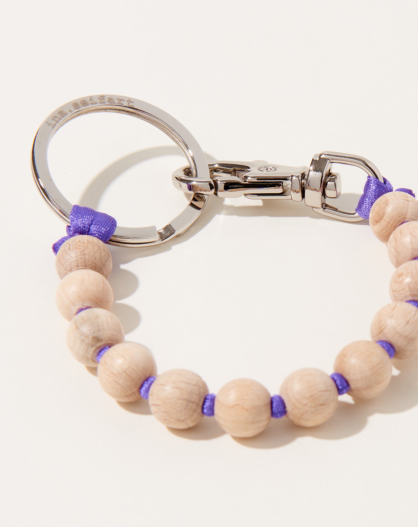 Ina Seifart Perlen Short Keyholder in Natural on Purple