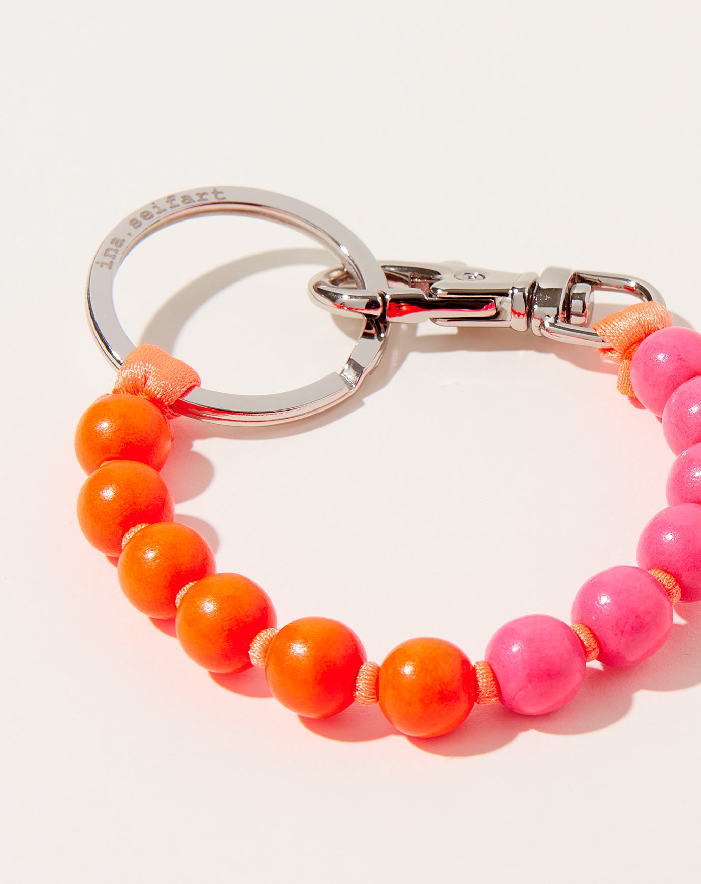 Ina Seifart Perlen Short Keyholder in Neon Orange and Neon Pink