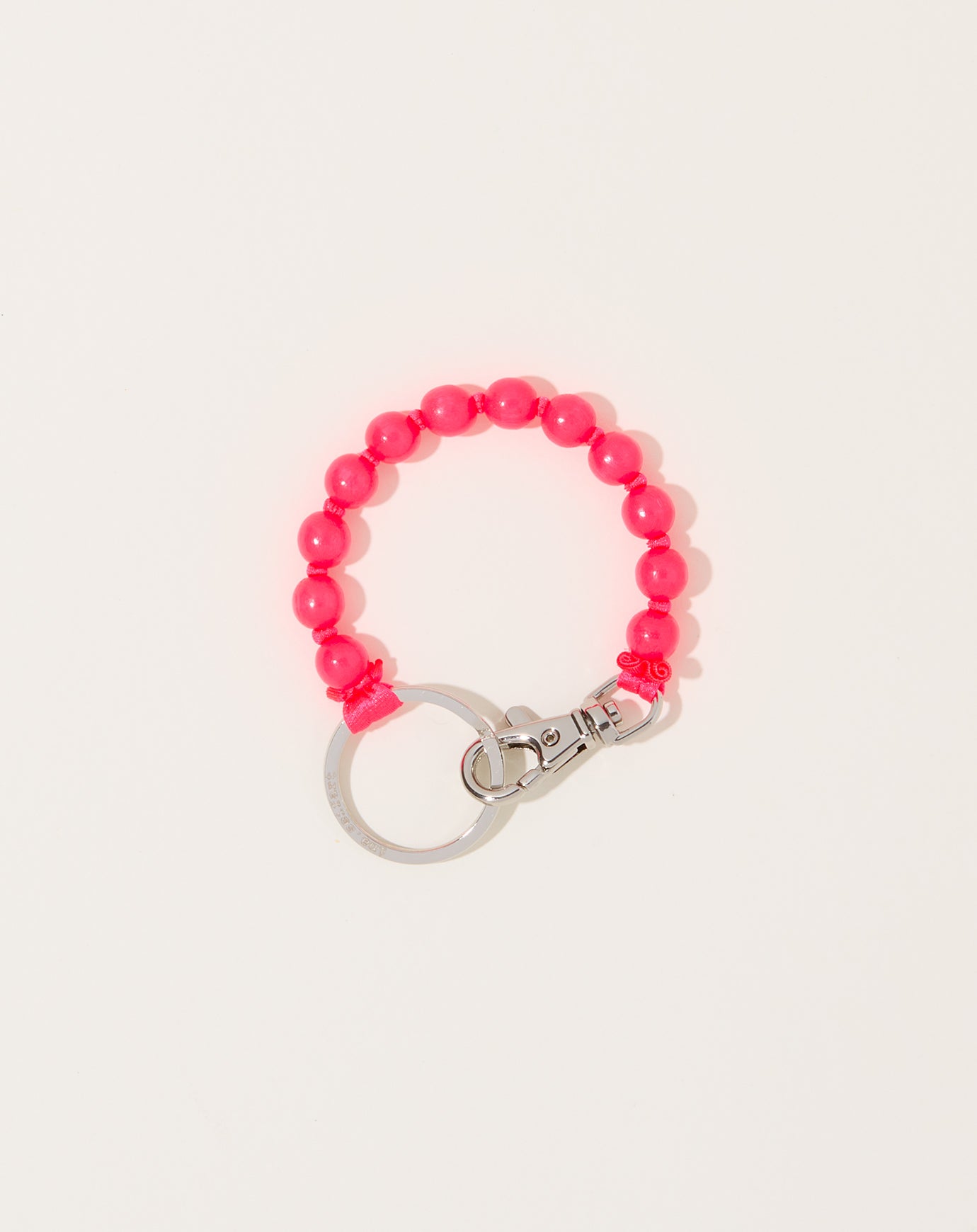 Ina Seifart Perlen Short Keyholder in Neon Pink