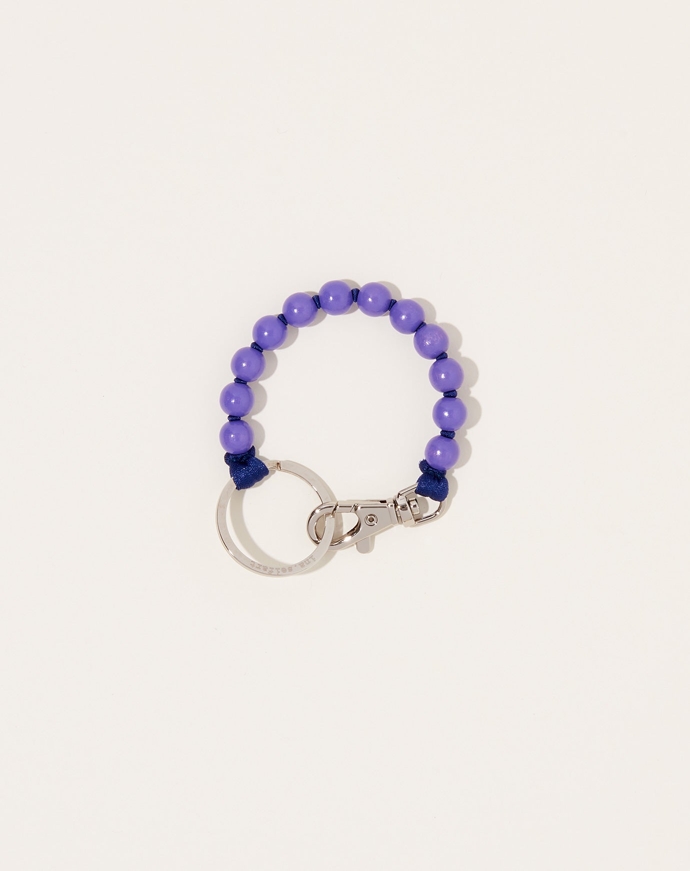 Ina Seifart Perlen Short Keyholder in Purple on Dark Blue