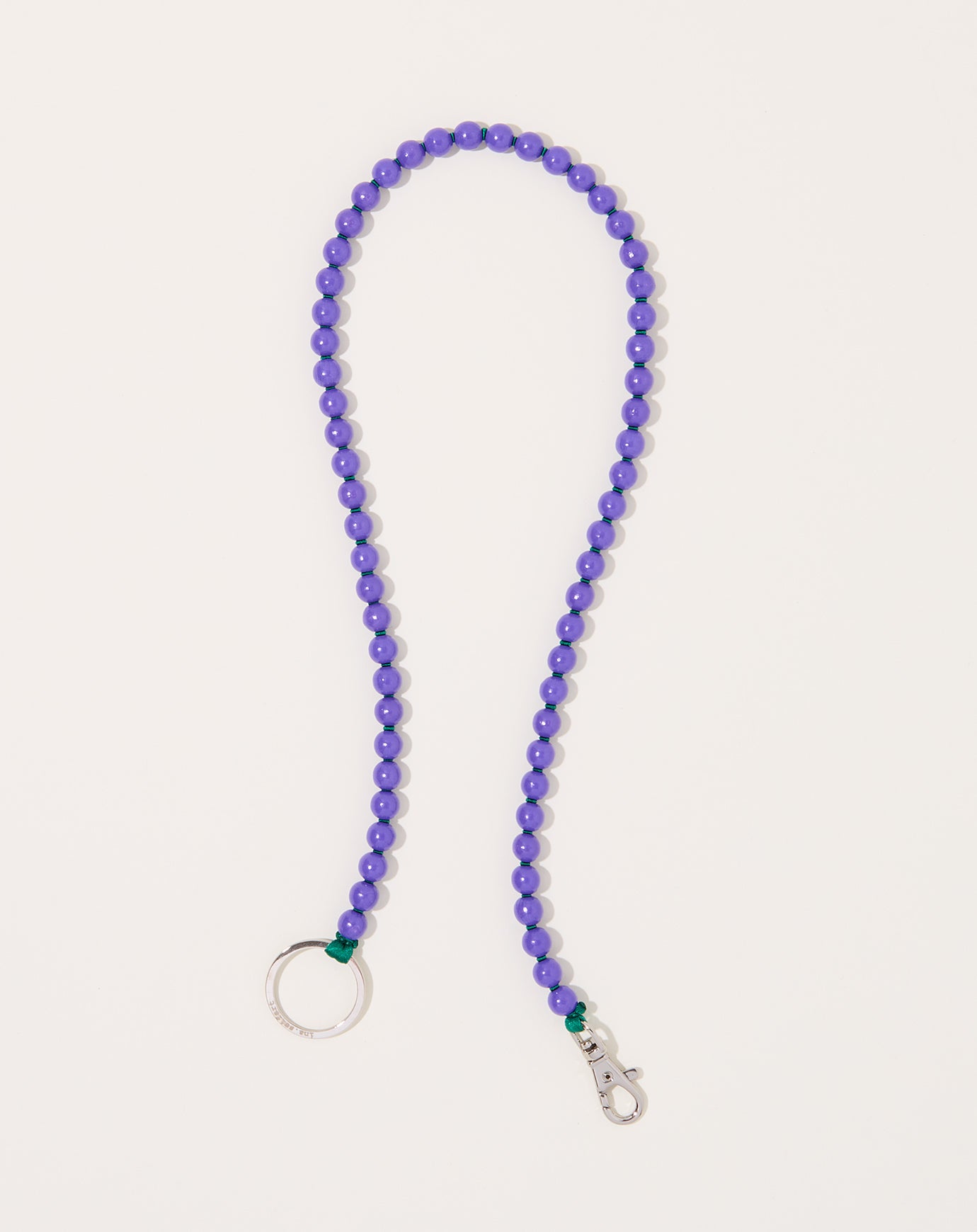 Ina Seifart Perlen Long Keyholder in Purple on Green