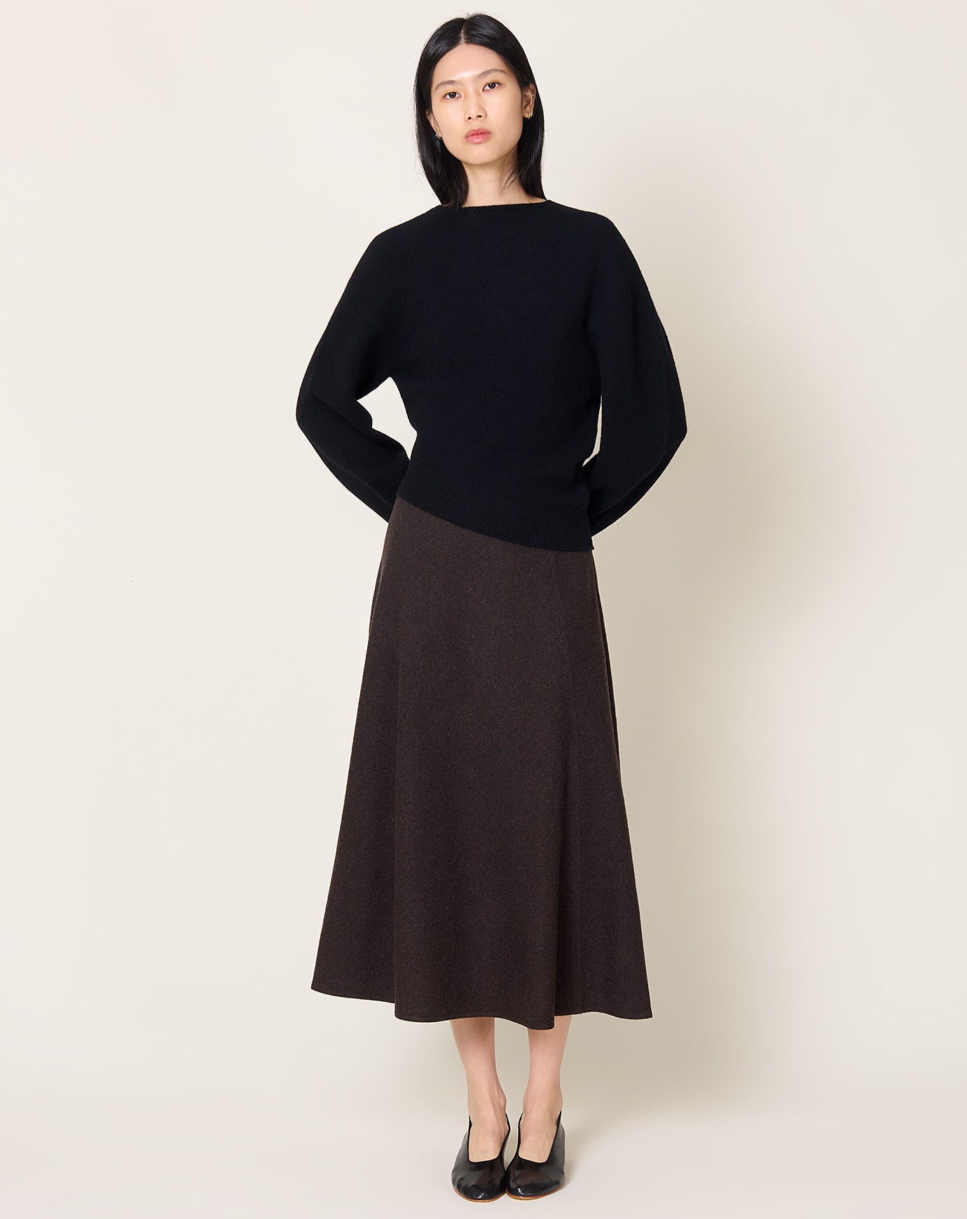 Le17septembre Cara Twisted Asymmetric Knit Top in Black