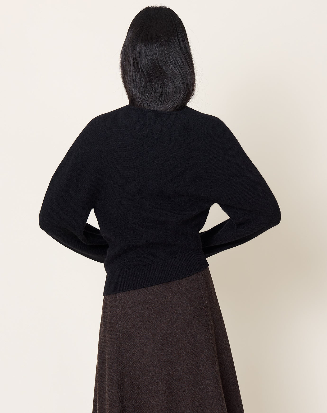 Le17septembre Cara Twisted Asymmetric Knit Top in Black