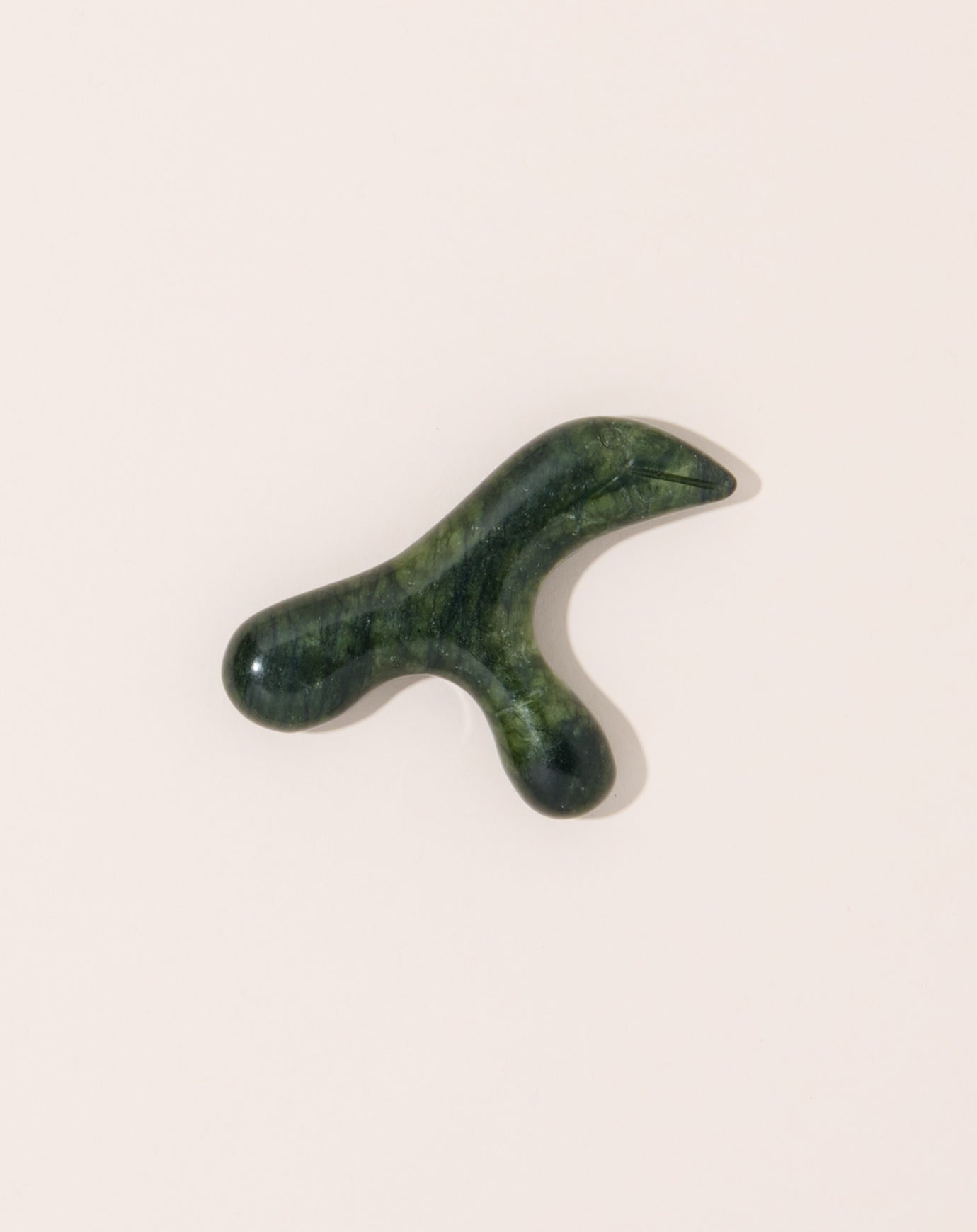 The Wax Apple Jade Toucan Massager