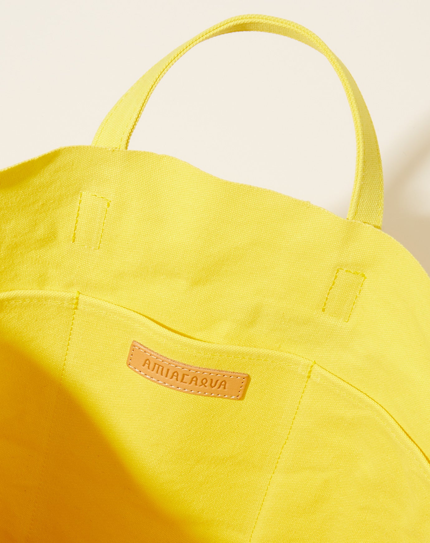 Amiacalva Light Ouce Canvas Tall Tote in Yellow