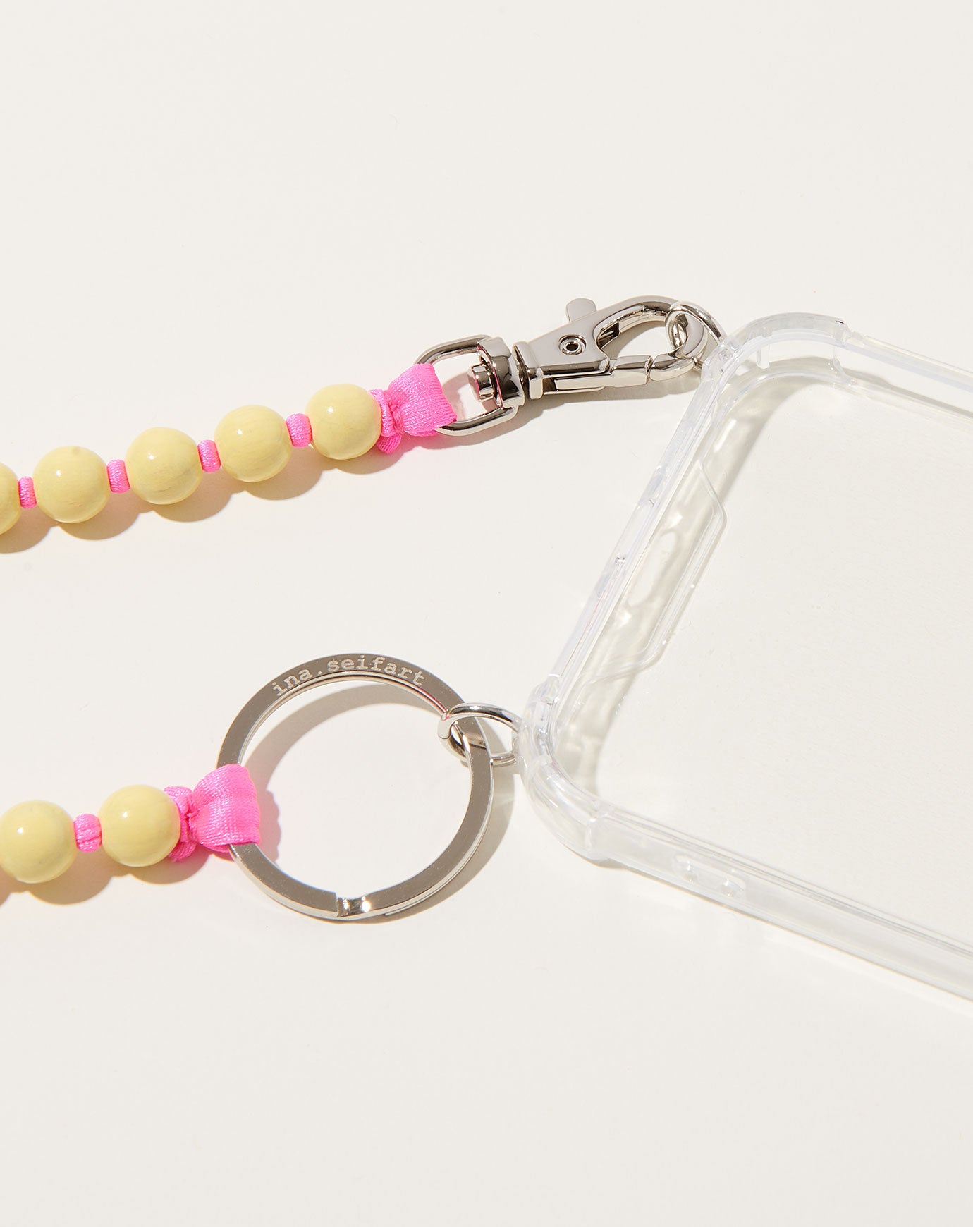 Ina Seifart Handykette iPhone Necklace in Pastel Yellow on Pink