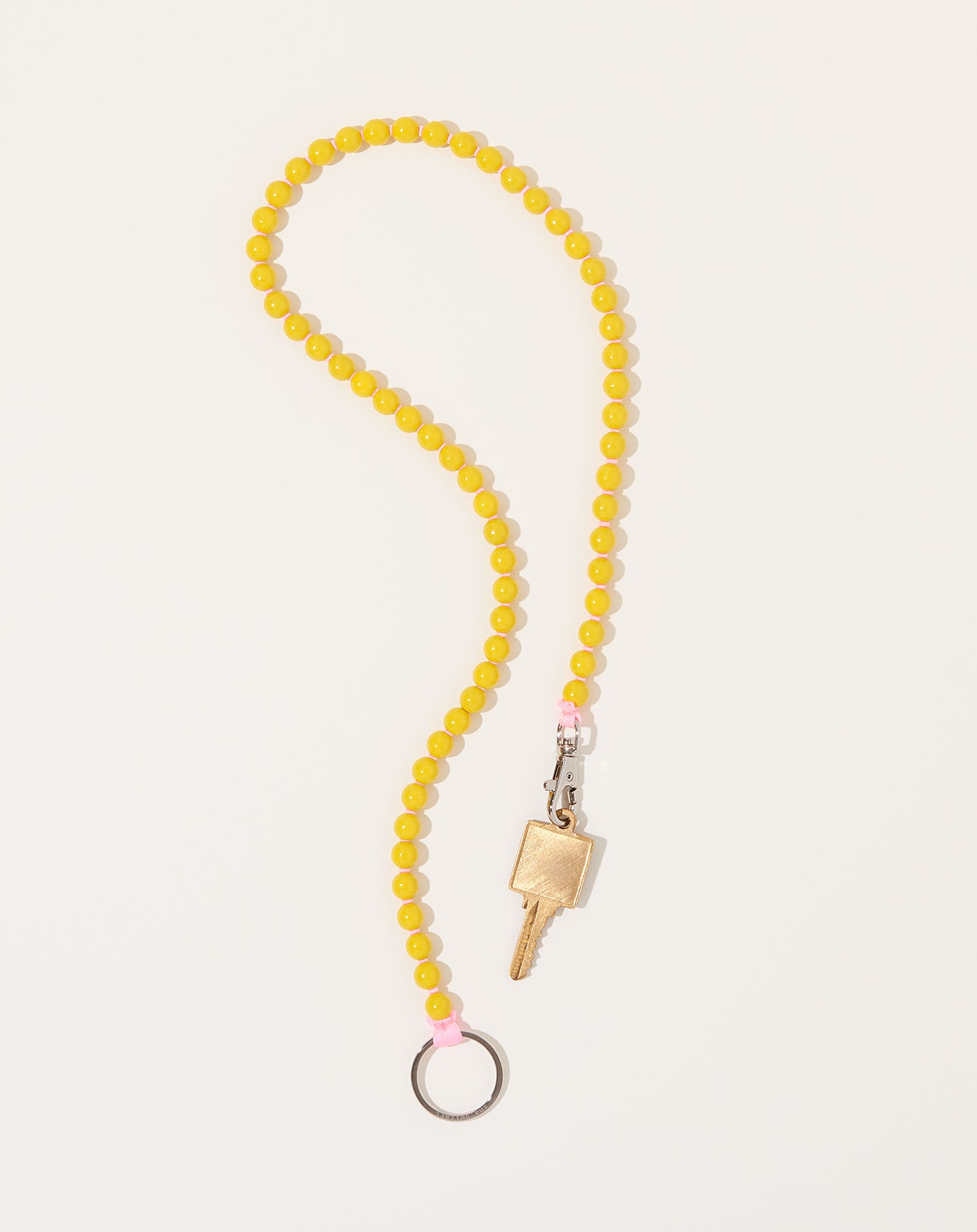 Ina Seifart Perlen Long Keyholder in Yellow on Rose