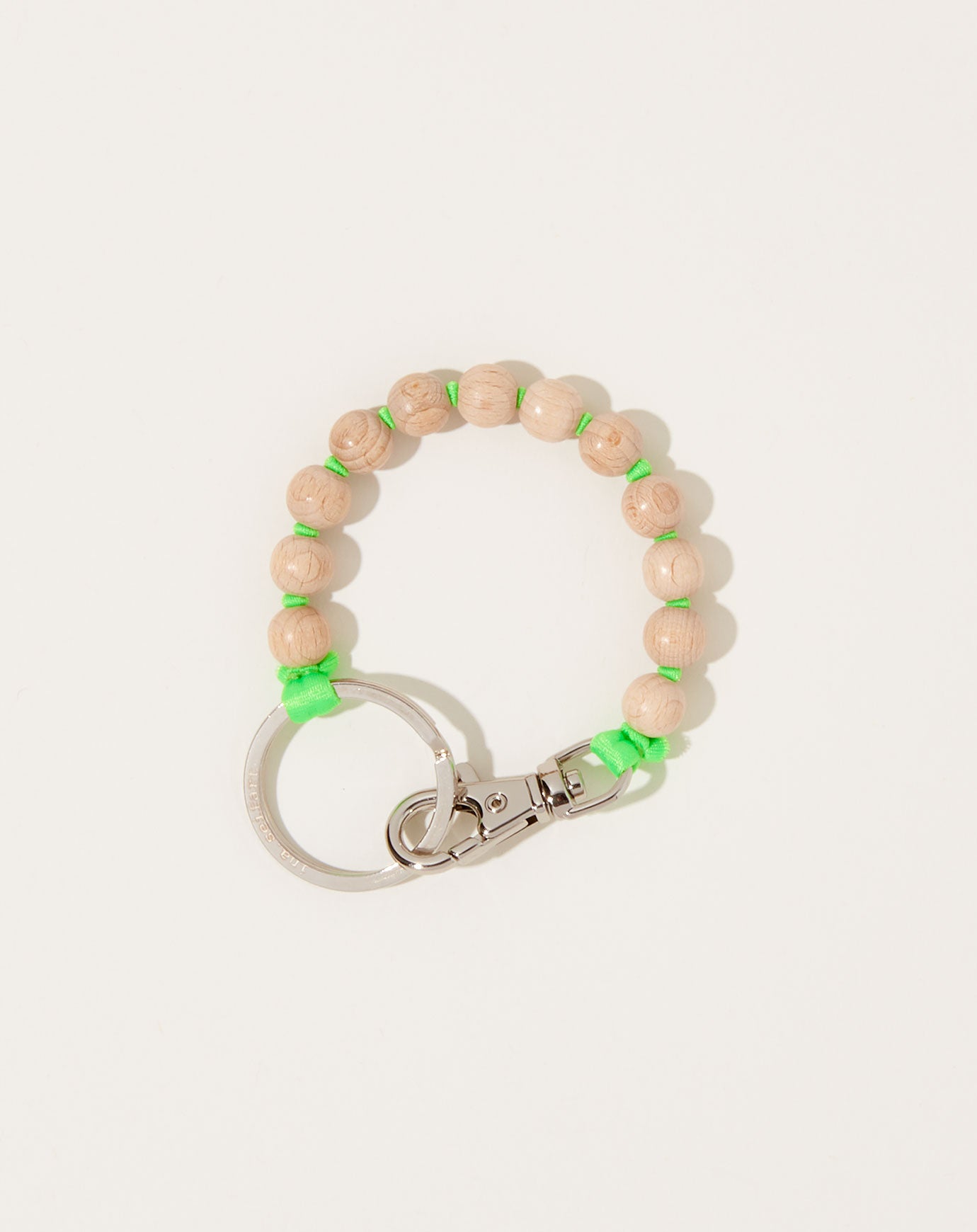 Ina Seifart Perlen Short Keyholder in Natural on Neon Green